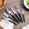 16pc Cutlery Set Whit Black Plastic Handles